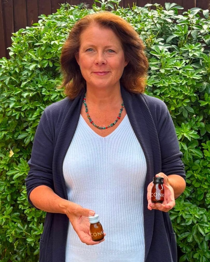 A CONKA customer holding the daily shots